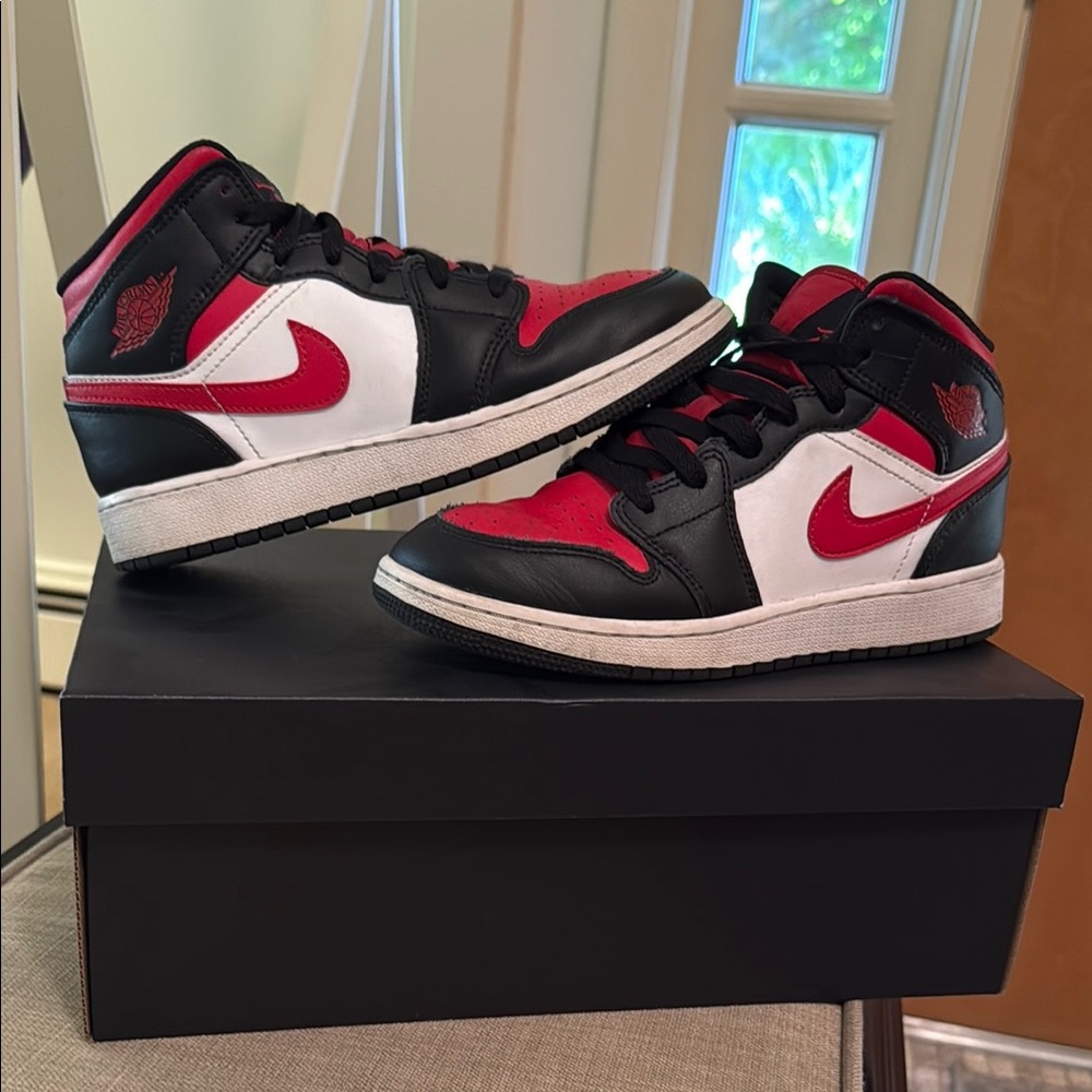 Nike Air Jordan 1 Mid Black and Red Sneakers